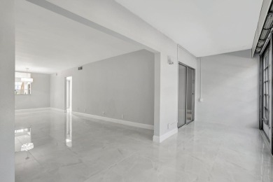 FULLY RENOVATED 2-Bedroom Condo in the Heart of Wynmoor! This on Wynmoor Golf Course in Florida - for sale on GolfHomes.com, golf home, golf lot