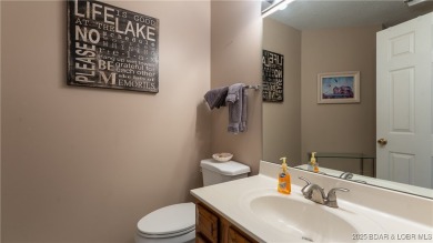 Boasting expansive main channel views and the superb amenities on Seasons Ridge At Four Seasons in Missouri - for sale on GolfHomes.com, golf home, golf lot