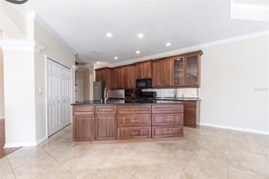 Welcome to 7211 Treymore Ct., an elegant and meticulously on Palm Aire Country Club of Sarasota in Florida - for sale on GolfHomes.com, golf home, golf lot