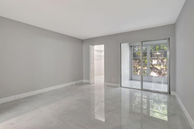 FULLY RENOVATED 2-Bedroom Condo in the Heart of Wynmoor! This on Wynmoor Golf Course in Florida - for sale on GolfHomes.com, golf home, golf lot
