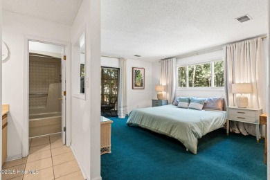Welcome to your turnkey coastal retreat, fully furnished and on Oyster Bay Golf Links in North Carolina - for sale on GolfHomes.com, golf home, golf lot
