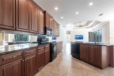 Welcome to 7211 Treymore Ct., an elegant and meticulously on Palm Aire Country Club of Sarasota in Florida - for sale on GolfHomes.com, golf home, golf lot