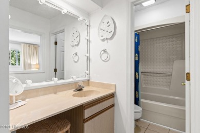Welcome to your turnkey coastal retreat, fully furnished and on Oyster Bay Golf Links in North Carolina - for sale on GolfHomes.com, golf home, golf lot