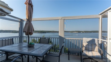 Boasting expansive main channel views and the superb amenities on Seasons Ridge At Four Seasons in Missouri - for sale on GolfHomes.com, golf home, golf lot