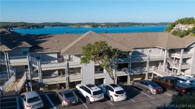 Boasting expansive main channel views and the superb amenities on Seasons Ridge At Four Seasons in Missouri - for sale on GolfHomes.com, golf home, golf lot