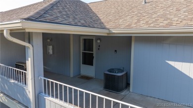 Boasting expansive main channel views and the superb amenities on Seasons Ridge At Four Seasons in Missouri - for sale on GolfHomes.com, golf home, golf lot