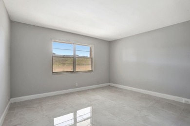 FULLY RENOVATED 2-Bedroom Condo in the Heart of Wynmoor! This on Wynmoor Golf Course in Florida - for sale on GolfHomes.com, golf home, golf lot