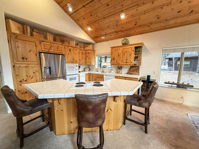 Mountain home for sale on the 6th fairway of Whitehawk Ranch on Whitehawk Ranch Golf Club in California - for sale on GolfHomes.com, golf home, golf lot