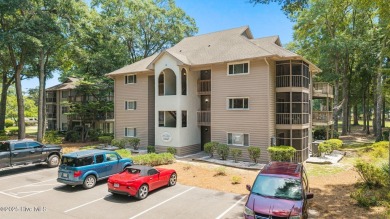 Welcome to your turnkey coastal retreat, fully furnished and on Oyster Bay Golf Links in North Carolina - for sale on GolfHomes.com, golf home, golf lot