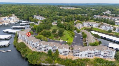 Boasting expansive main channel views and the superb amenities on Seasons Ridge At Four Seasons in Missouri - for sale on GolfHomes.com, golf home, golf lot