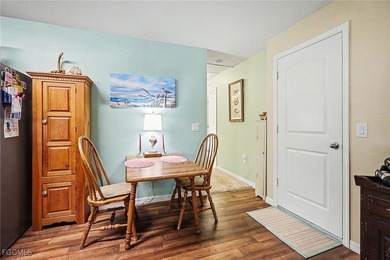 Welcome to this charming home nestled in a VERY FRIENDLY, GATED on Copperhead Golf Club in Florida - for sale on GolfHomes.com, golf home, golf lot