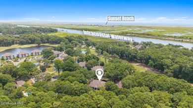 Welcome to your turnkey coastal retreat, fully furnished and on Oyster Bay Golf Links in North Carolina - for sale on GolfHomes.com, golf home, golf lot