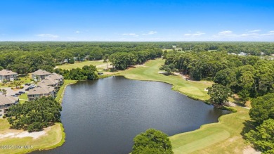 Welcome to your turnkey coastal retreat, fully furnished and on Oyster Bay Golf Links in North Carolina - for sale on GolfHomes.com, golf home, golf lot