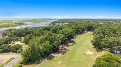 Welcome to your turnkey coastal retreat, fully furnished and on Oyster Bay Golf Links in North Carolina - for sale on GolfHomes.com, golf home, golf lot