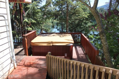 Avondale Lakefront Living! Perfectly situated on the tranquil on Avondale Golf and Tennis Club in Idaho - for sale on GolfHomes.com, golf home, golf lot