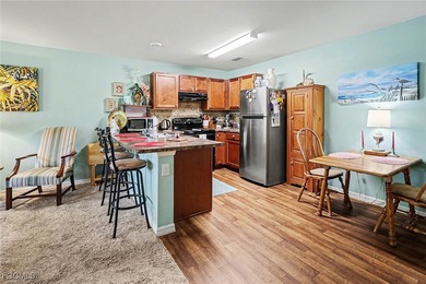 Welcome to this charming home nestled in a VERY FRIENDLY, GATED on Copperhead Golf Club in Florida - for sale on GolfHomes.com, golf home, golf lot