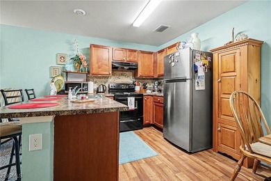 Welcome to this charming home nestled in a VERY FRIENDLY, GATED on Copperhead Golf Club in Florida - for sale on GolfHomes.com, golf home, golf lot