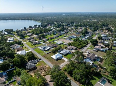 Located in the desirable Lake Haven Estates and Lake Huckleberry on Harder Hall Exec Golf Course in Florida - for sale on GolfHomes.com, golf home, golf lot