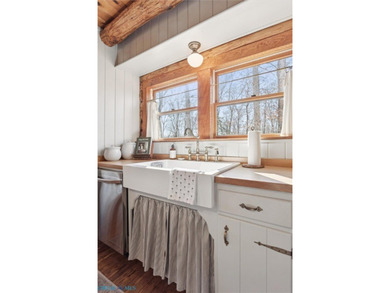 Entering into 322 Fairfield, you are engulfed in warmth.  This on Piankatank River Golf Club in Virginia - for sale on GolfHomes.com, golf home, golf lot