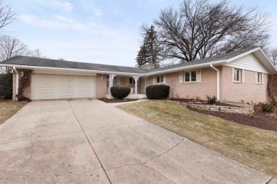 Awesome mid-century ranch w/full walk-out lower level. Overlooks on Mauh-Nah-Tee-See Country Club in Illinois - for sale on GolfHomes.com, golf home, golf lot