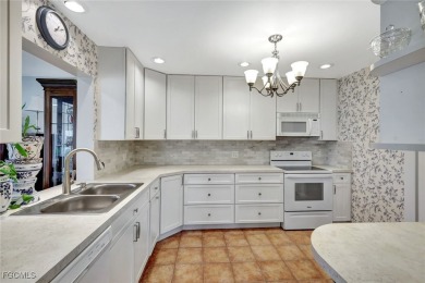 This beautifully maintained first-floor end unit offers 2 on Cypress Lake Country Club in Florida - for sale on GolfHomes.com, golf home, golf lot