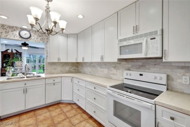 This beautifully maintained first-floor end unit offers 2 on Cypress Lake Country Club in Florida - for sale on GolfHomes.com, golf home, golf lot