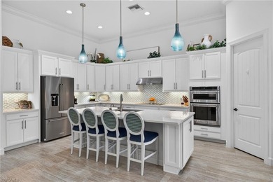 Experience elevated living in this Stonewater two story floor on The Plantation Golf and Country Club in Florida - for sale on GolfHomes.com, golf home, golf lot