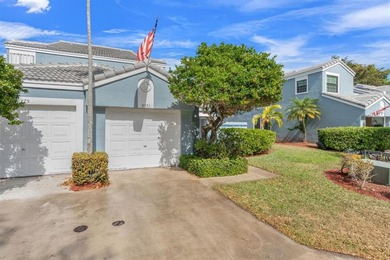 Great buy! Just reduced! Spacious, bright corner-unit townhome on Woodmont Country Club in Florida - for sale on GolfHomes.com, golf home, golf lot