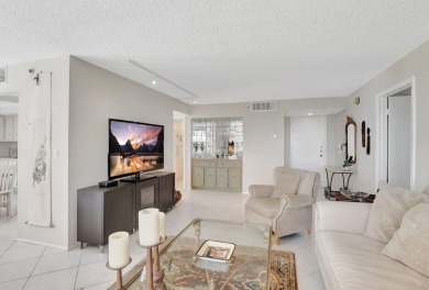 BRIDGEWOOD  2 BED 2 BATH CORNER UNIT. THE VILLAGE OF BRIDGEWOOD on Boca West Golf and Country Club in Florida - for sale on GolfHomes.com, golf home, golf lot