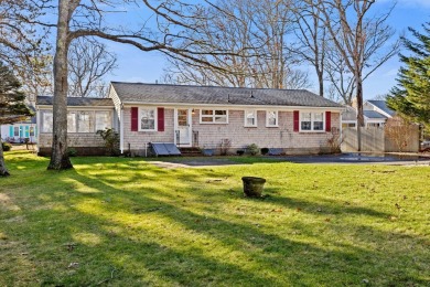 Discover this charming South Yarmouth gem w/ end-of-street water on Bass River Golf Course in Massachusetts - for sale on GolfHomes.com, golf home, golf lot