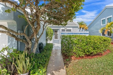 Great buy! Just reduced! Spacious, bright corner-unit townhome on Woodmont Country Club in Florida - for sale on GolfHomes.com, golf home, golf lot