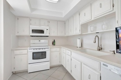 BRIDGEWOOD  2 BED 2 BATH CORNER UNIT. THE VILLAGE OF BRIDGEWOOD on Boca West Golf and Country Club in Florida - for sale on GolfHomes.com, golf home, golf lot