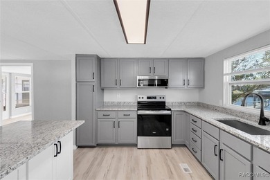 MOVE IN READY! Located on one of the most widest and deepest on Beacon Woods Golf Club in Florida - for sale on GolfHomes.com, golf home, golf lot