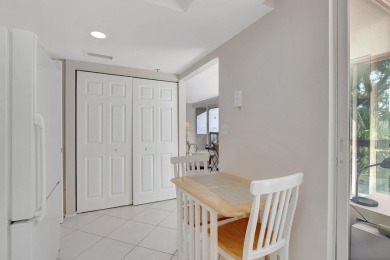 BRIDGEWOOD  2 BED 2 BATH CORNER UNIT. THE VILLAGE OF BRIDGEWOOD on Boca West Golf and Country Club in Florida - for sale on GolfHomes.com, golf home, golf lot