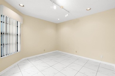 Great buy! Just reduced! Spacious, bright corner-unit townhome on Woodmont Country Club in Florida - for sale on GolfHomes.com, golf home, golf lot