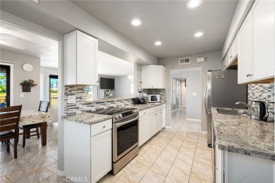 Experience this one-of-a-kind remodeled condo with breathtaking on Cathedral Canyon Golf and Tennis Club in California - for sale on GolfHomes.com, golf home, golf lot