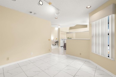 Great buy! Just reduced! Spacious, bright corner-unit townhome on Woodmont Country Club in Florida - for sale on GolfHomes.com, golf home, golf lot