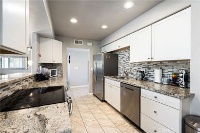 Experience this one-of-a-kind remodeled condo with breathtaking on Cathedral Canyon Golf and Tennis Club in California - for sale on GolfHomes.com, golf home, golf lot