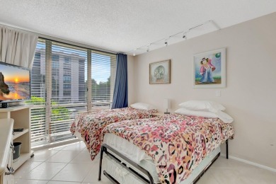 BRIDGEWOOD  2 BED 2 BATH CORNER UNIT. THE VILLAGE OF BRIDGEWOOD on Boca West Golf and Country Club in Florida - for sale on GolfHomes.com, golf home, golf lot