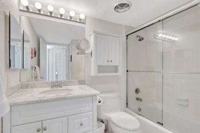 BRIDGEWOOD  2 BED 2 BATH CORNER UNIT. THE VILLAGE OF BRIDGEWOOD on Boca West Golf and Country Club in Florida - for sale on GolfHomes.com, golf home, golf lot