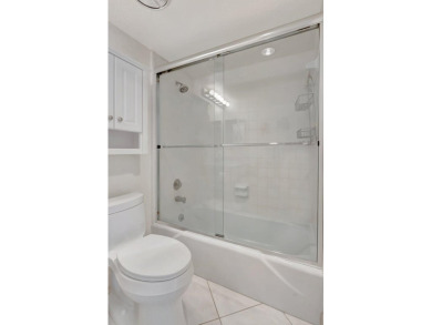 BRIDGEWOOD  2 BED 2 BATH CORNER UNIT. THE VILLAGE OF BRIDGEWOOD on Boca West Golf and Country Club in Florida - for sale on GolfHomes.com, golf home, golf lot