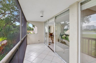 BRIDGEWOOD  2 BED 2 BATH CORNER UNIT. THE VILLAGE OF BRIDGEWOOD on Boca West Golf and Country Club in Florida - for sale on GolfHomes.com, golf home, golf lot