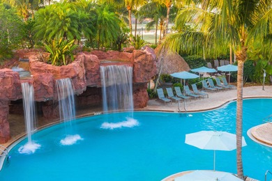 Perfectly positioned in the heart of Lely Resort, this furnished on Lely Resort Golf and Country Club in Florida - for sale on GolfHomes.com, golf home, golf lot