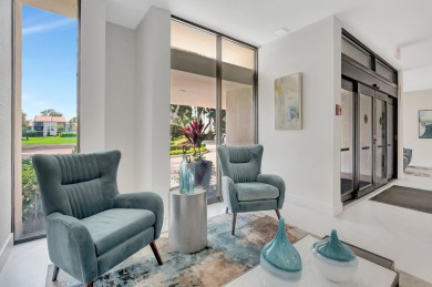 BRIDGEWOOD  2 BED 2 BATH CORNER UNIT. THE VILLAGE OF BRIDGEWOOD on Boca West Golf and Country Club in Florida - for sale on GolfHomes.com, golf home, golf lot