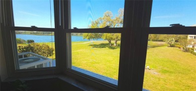 UNOBSTRUTIVE VIEW OF LAKE ARBOR A BOATING AND CANOOING ON THE on On Top Of The World Golf Course in Florida - for sale on GolfHomes.com, golf home, golf lot