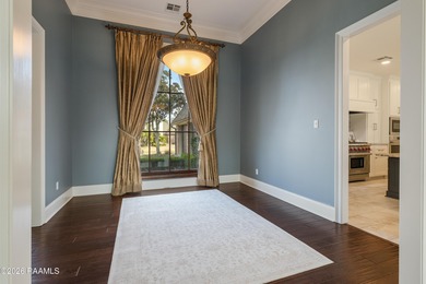 Located in the gated golf community of LeTriomphe, this on LeTriomphe Golf and Country Club in Louisiana - for sale on GolfHomes.com, golf home, golf lot