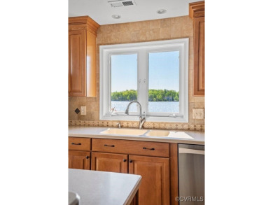 Welcome to your dream lakefront retreat! This stunning 5-bedroom on Lake Of The Woods Golf Course in Virginia - for sale on GolfHomes.com, golf home, golf lot