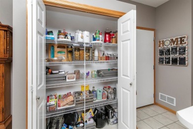 Welcome to this move-in ready 2-bedroom, 1.5-bathroom corner on Otter Creek Golf Course in Iowa - for sale on GolfHomes.com, golf home, golf lot