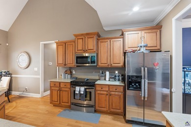 Beautifully maintained and move-in ready, this home is located on Canongate At Healy Point Country Club in Georgia - for sale on GolfHomes.com, golf home, golf lot