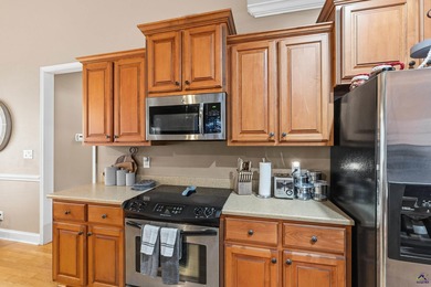 Beautifully maintained and move-in ready, this home is located on Canongate At Healy Point Country Club in Georgia - for sale on GolfHomes.com, golf home, golf lot